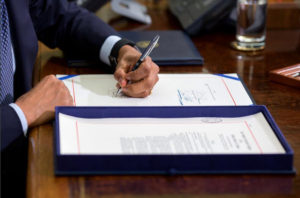 President Obama signs the Defend Trade Secrets Act on May 11, 2016. White House photo by Pete Souza used pursuant to 17 U.S.C. 105.