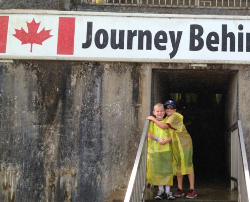 The author's children about to visit Journey Behind the Falls in Ontario, Canada